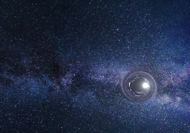 ブラックホールが横切る宇宙